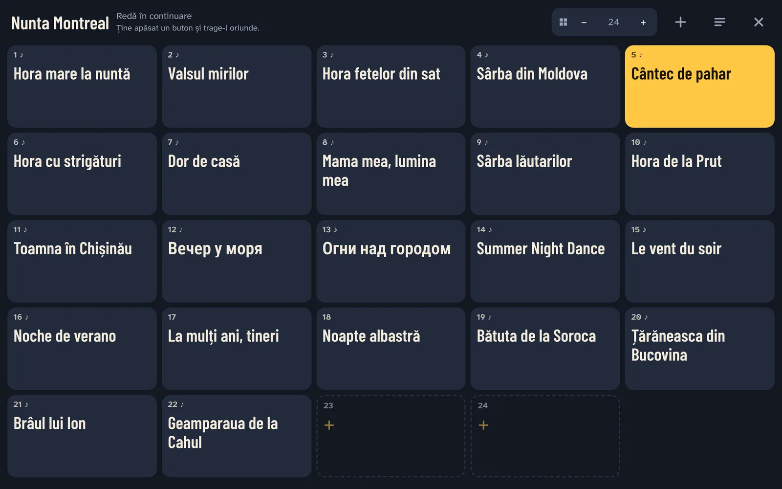 Playlistul unei nunți pe butoane mari, cântecul care cântă e galben.
